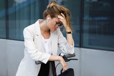 Young woman talking on phone