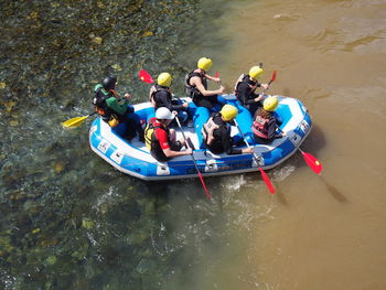 High angle view of people rafting in river