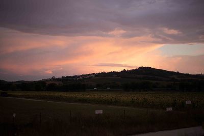 Scenic view of landscape at sunset