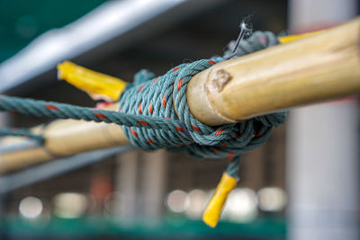 Close-up of rope tied on metal