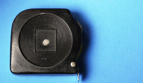 High angle view of camera on blue table