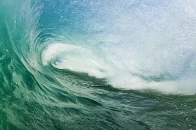 Close-up of rolling wave in sea