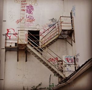 Low angle view of graffiti on building wall