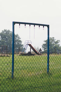 View of soccer field against clear sky