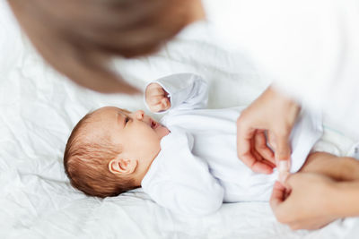 Mother taking care of baby