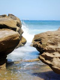 Scenic view of sea against clear sky