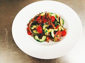 High angle view of fruit salad in plate on table