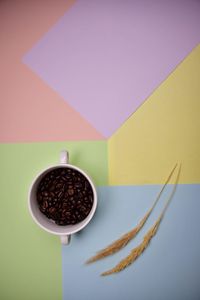 High angle view of coffee cup on table