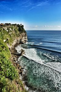 Scenic view of sea against blue sky