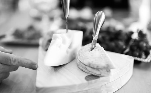 Close-up of hand holding ice cream