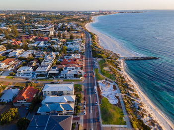 High angle view of cityscape by sea