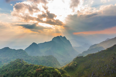 Scenic view of mountains against sky during sunset