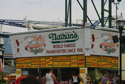 People in city against sky