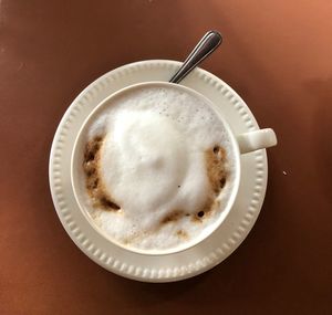 Directly above shot of coffee cup on table