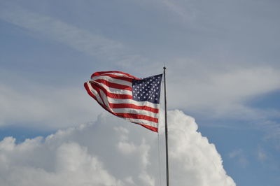 Low angle view of flag against sky