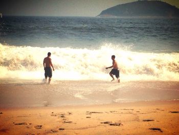 People enjoying at beach