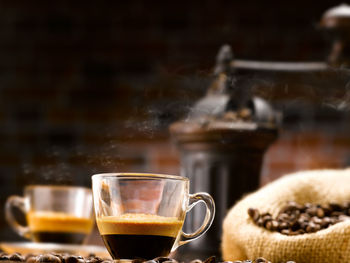 Close-up of coffee cup on table