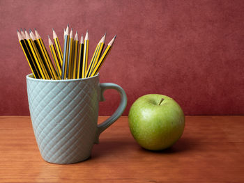 Close-up of apples on table