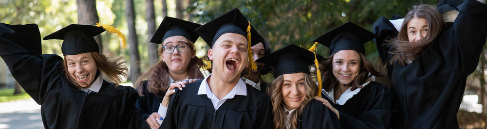 Portrait of woman wearing graduation gown