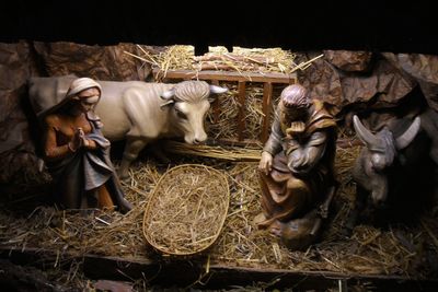 High angle view of figurines in church during christmas