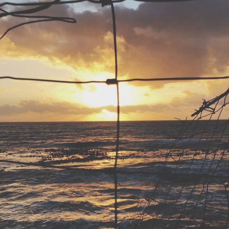 SCENIC VIEW OF SEA AGAINST ORANGE CLOUDY SKY