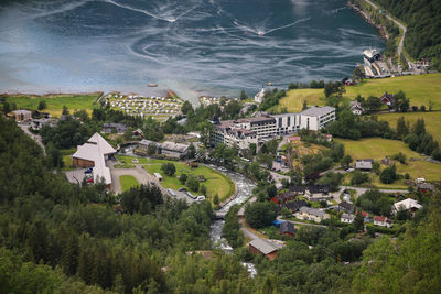 High angle view of buildings and trees in city