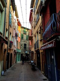 Narrow alley along buildings
