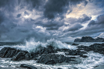 Scenic view of sea against cloudy sky