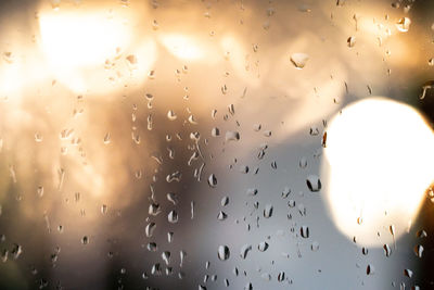 Close-up of raindrops on glass window