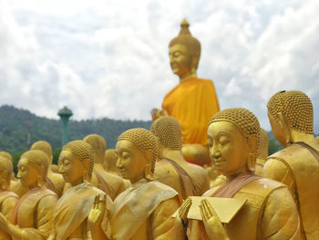 Statue of buddha against sky