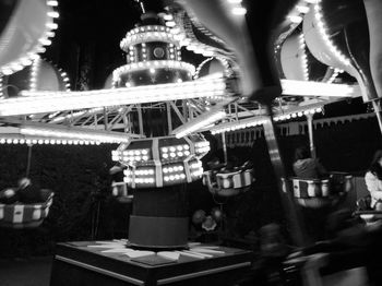 Illuminated carousel at amusement park