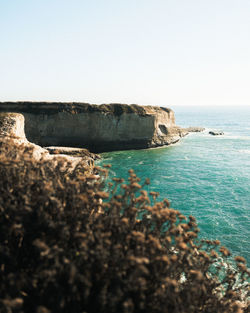 Scenic view of sea against clear sky