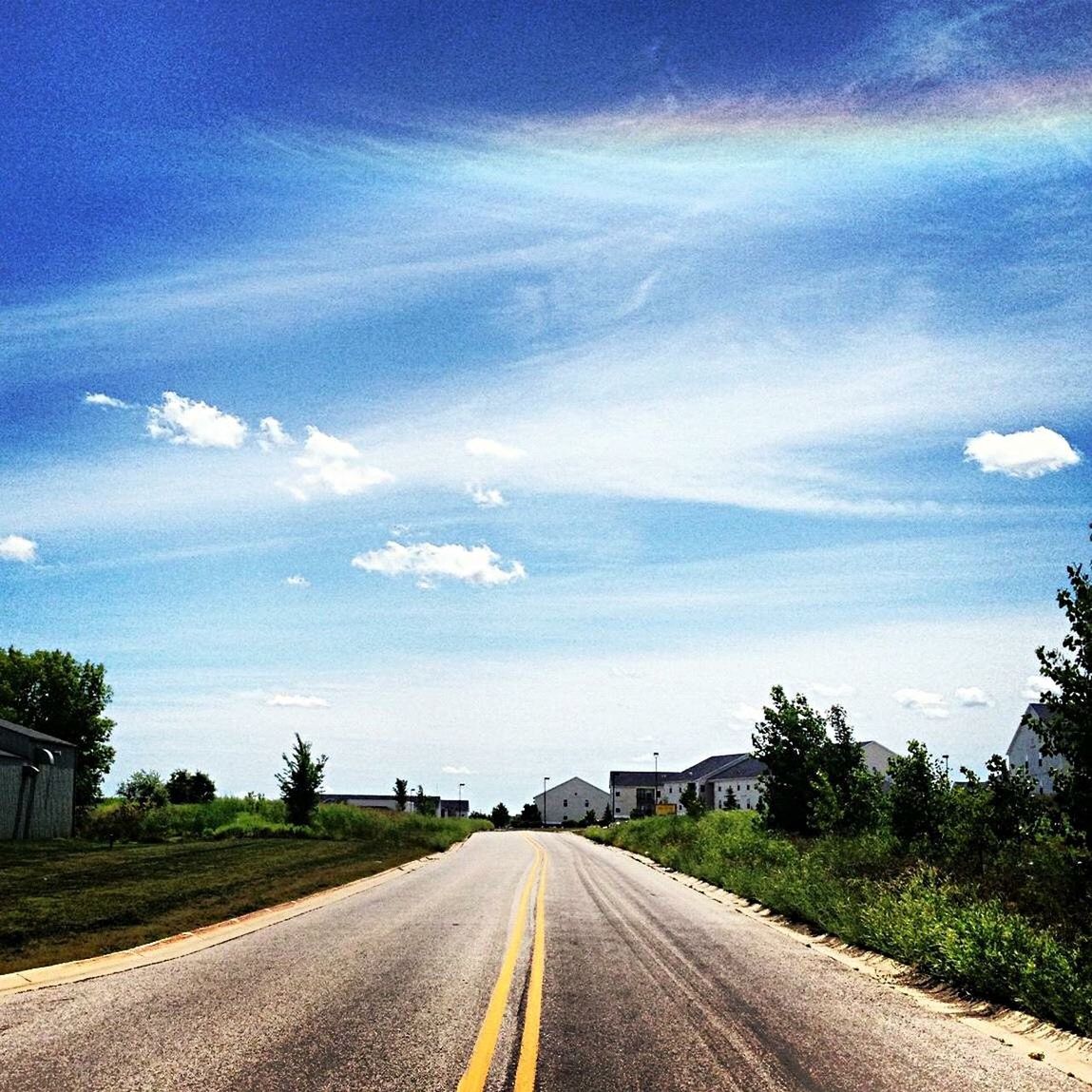 road, sky, the way forward, direction, cloud - sky, transportation, plant, tree, diminishing perspective, no people, nature, day, landscape, tranquility, tranquil scene, symbol, vanishing point, beauty in nature, road marking, field, outdoors, long