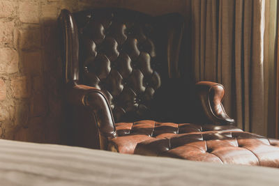 Close-up of armchair at home