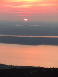 Scenic view of landscape against sky during sunset