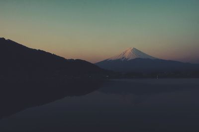 Scenic view of mountains against sky during sunset