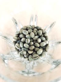 High angle view of eggs in glass jar on table