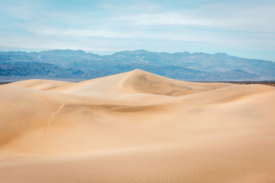 Scenic view of desert against sky