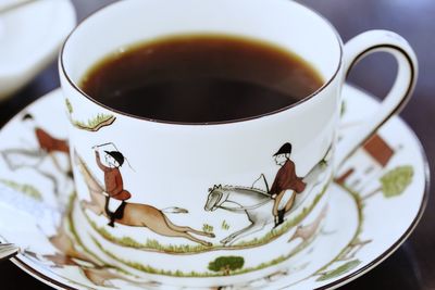 Close-up of coffee cup on table