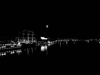 View of illuminated buildings in city at night