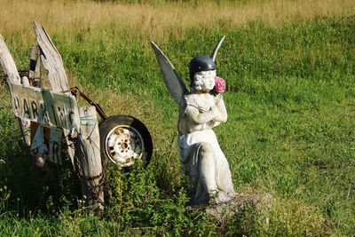 View of statue in field