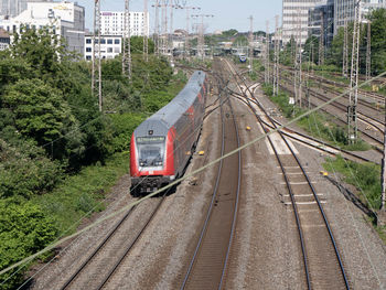 Train on railroad track in city