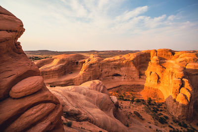 Scenic view of rock formations against sky