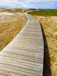 View of road passing through grass