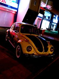 Cars on street at night