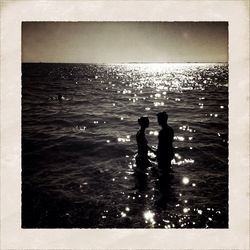 Reflection of people in water