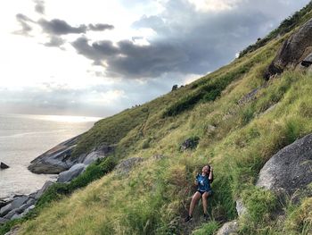 Full length of man on mountain against sky