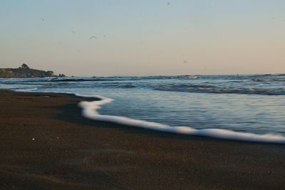 Scenic view of sea at sunset