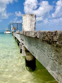 Pier over sea against sky