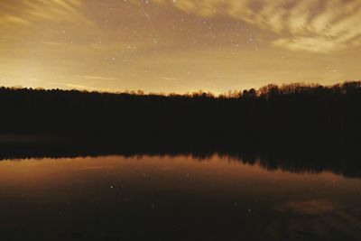 Reflection of trees in lake